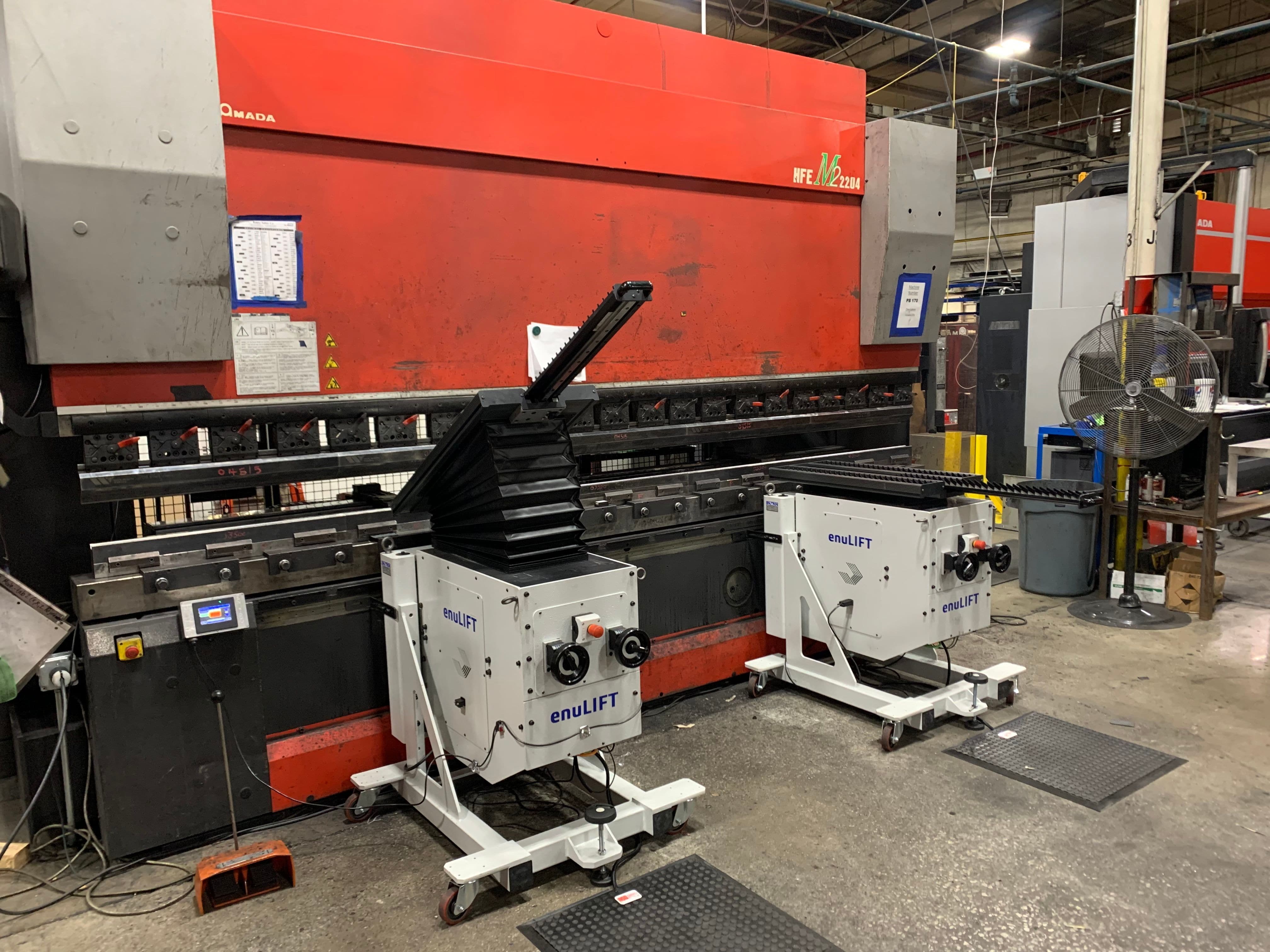 Amada press brake sheet follower solutions provided by EnuLIFT. Designed exclusively for press brake application, EnuLIFT supports and follows the material.