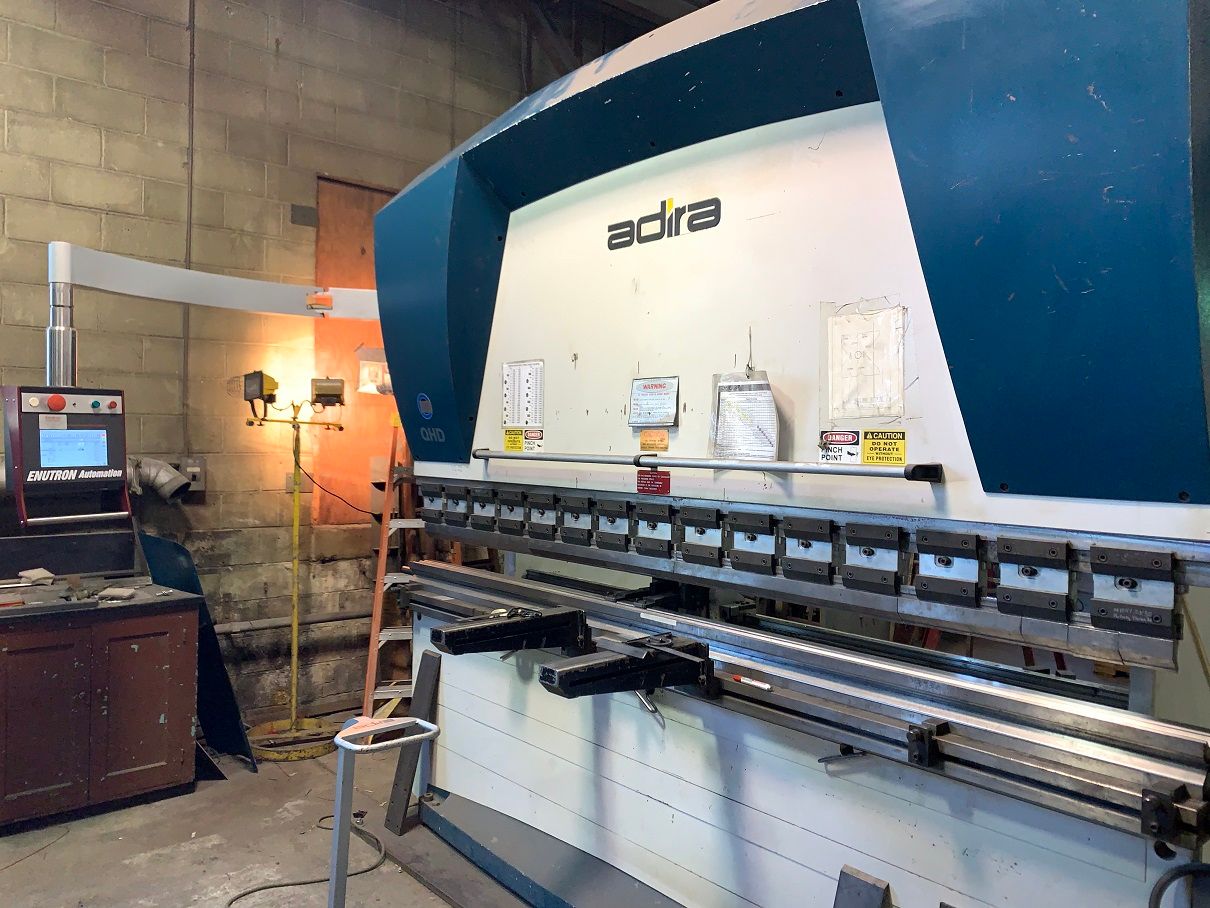 Enutron offers the Enu630T CNC control for all Adira press brakes. Adira QHD press brake retrofitted and upgraded with Enu630T CNC control.