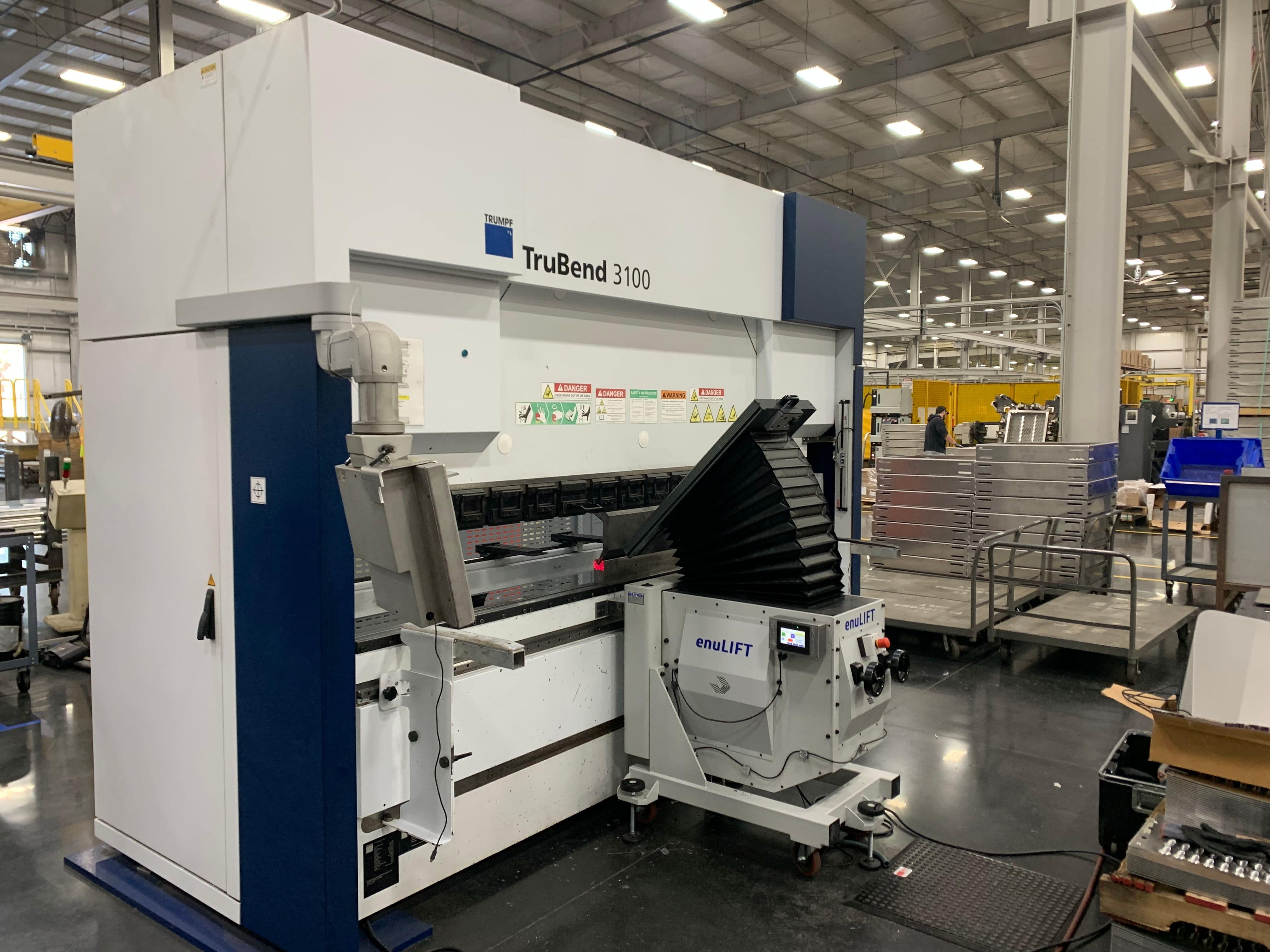 Trumpf TruBend 3100 retrofitted with EnuLIFT Sheet Follower for improved and safer material handling. Press brake sheet followers provided by EnuLIFT.