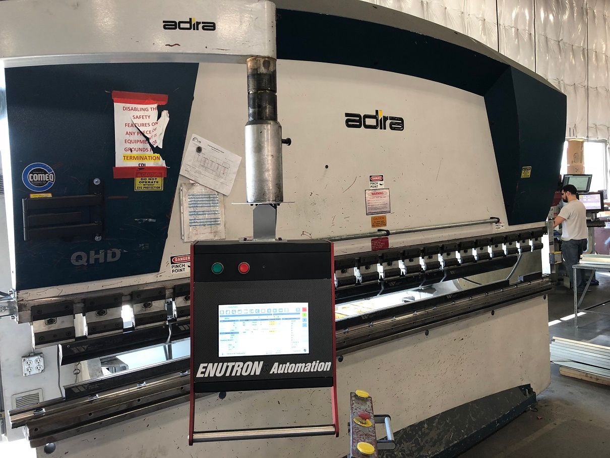 CNC control retrofits for Adira press brakes. Enu630T 4-axes CNC control upgrades for Adira press brakes. CNC backgauge retrofits, CNC backgauges.