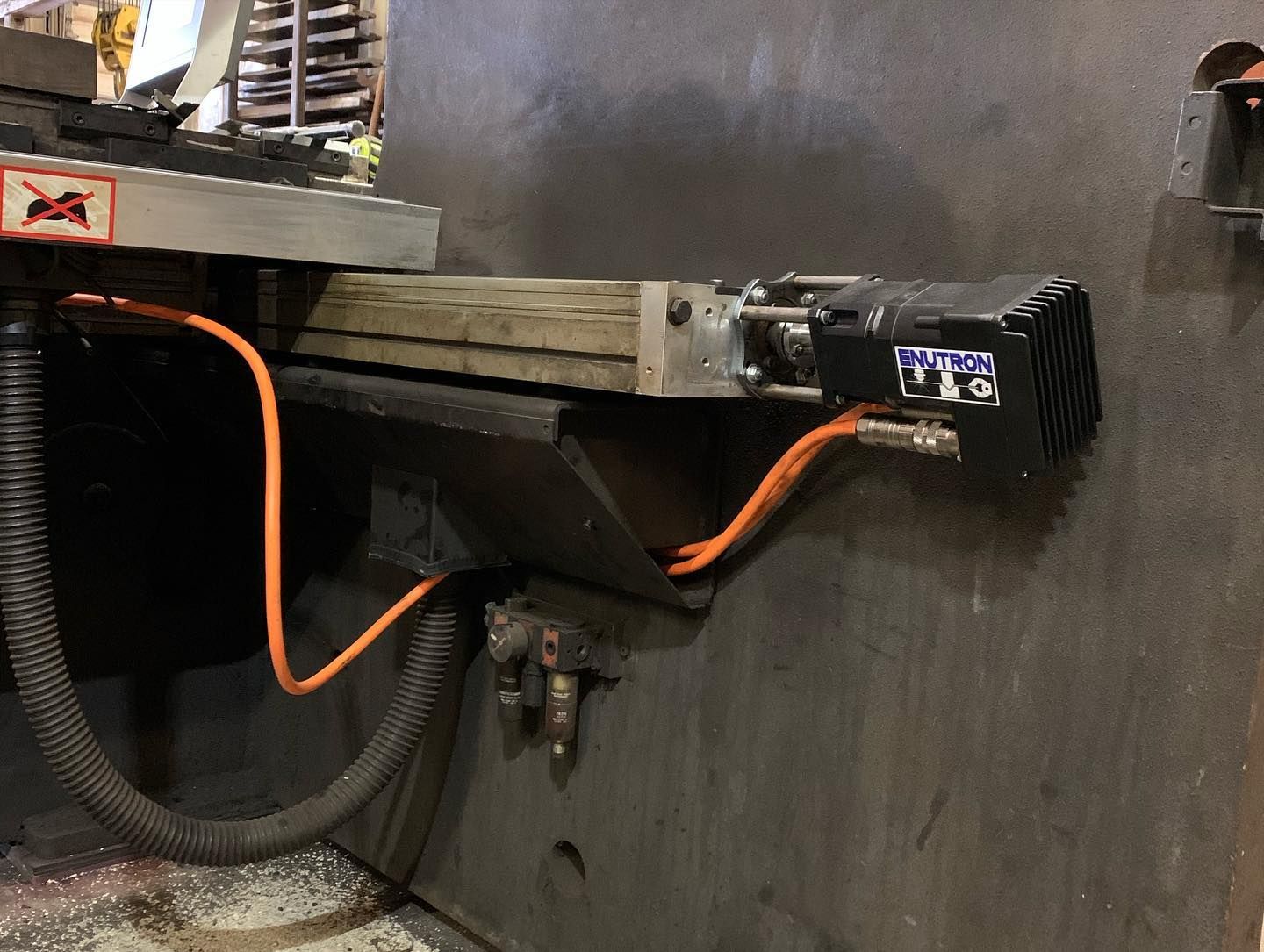 Amada HFB CNC control retrofit solutions. HFB 2204 retrofitted with latest Enu640T. Retrofit package includes EnuSMART servo motor for X1 and X2 axes.